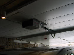 Ceiling consealing garage door rails